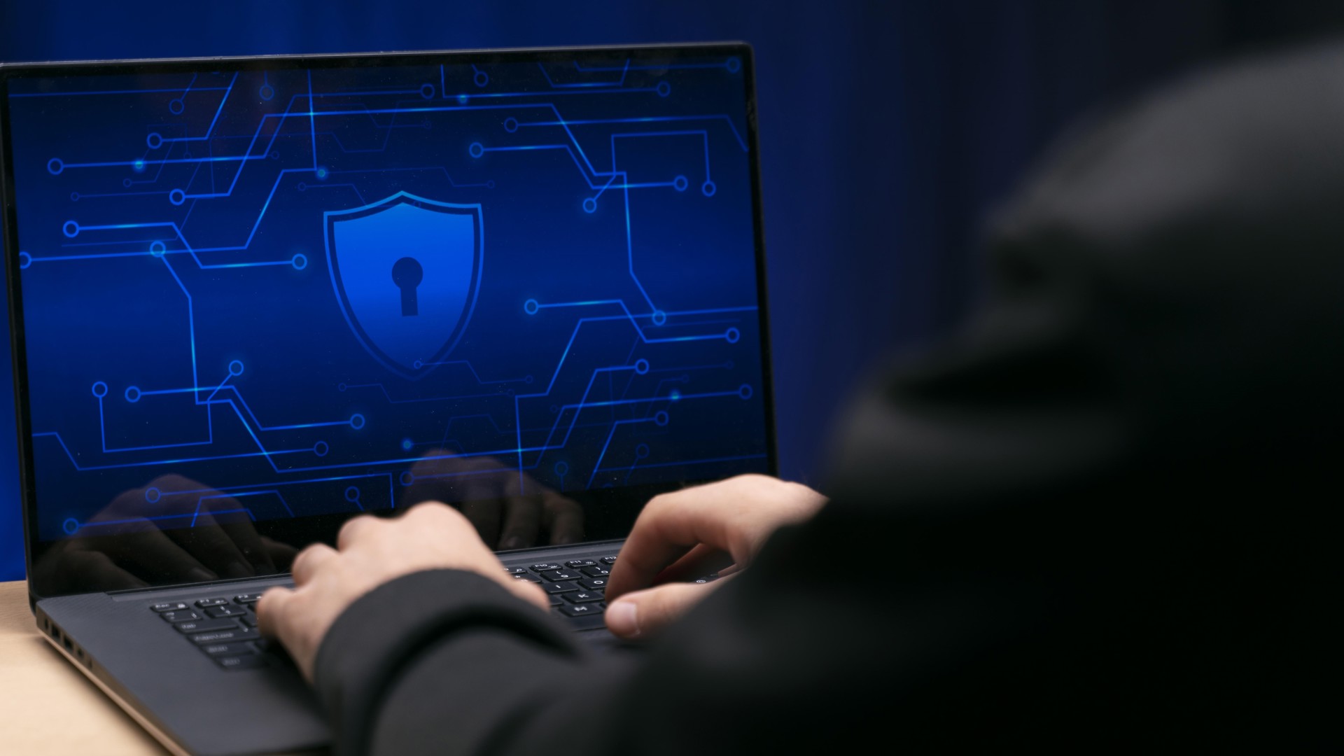 Cyber criminal on laptop